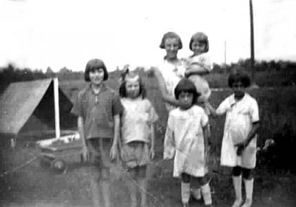 Back yard of 1686 Anita, c. 1928. Goethe & Hawthorne in background.